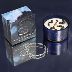 Vela de cristal y pulsera piedras preciosas, signo Cáncer