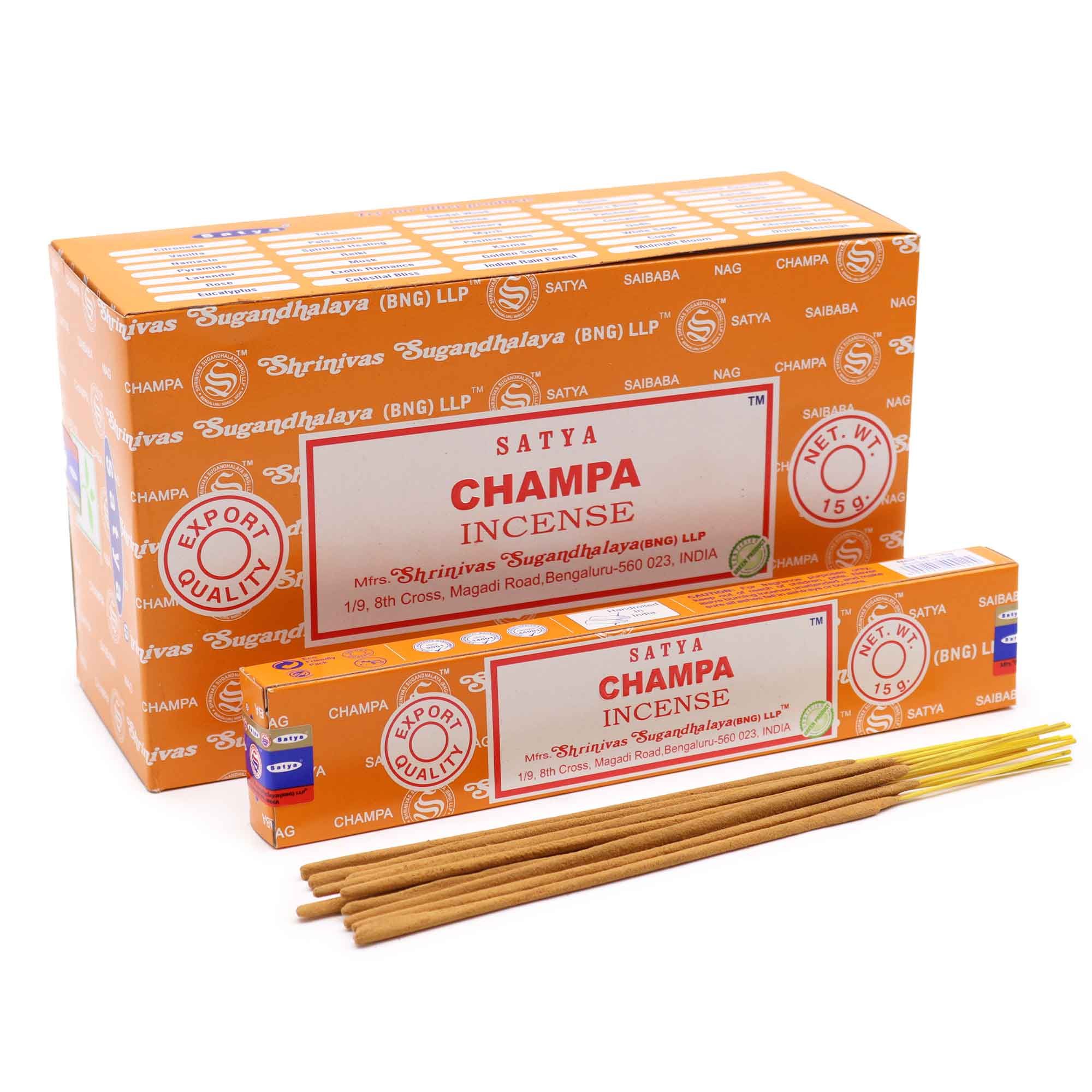 Caja y varillas de incienso Satya Champa en empaque naranja.