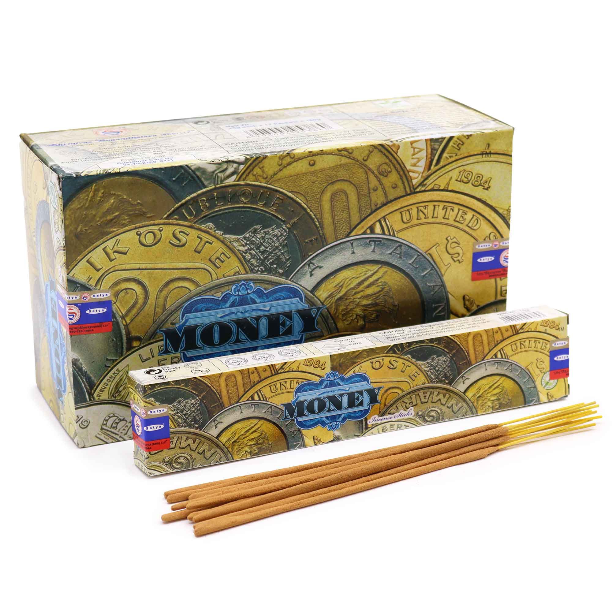 Caja de incienso Satya con motivos de monedas doradas.